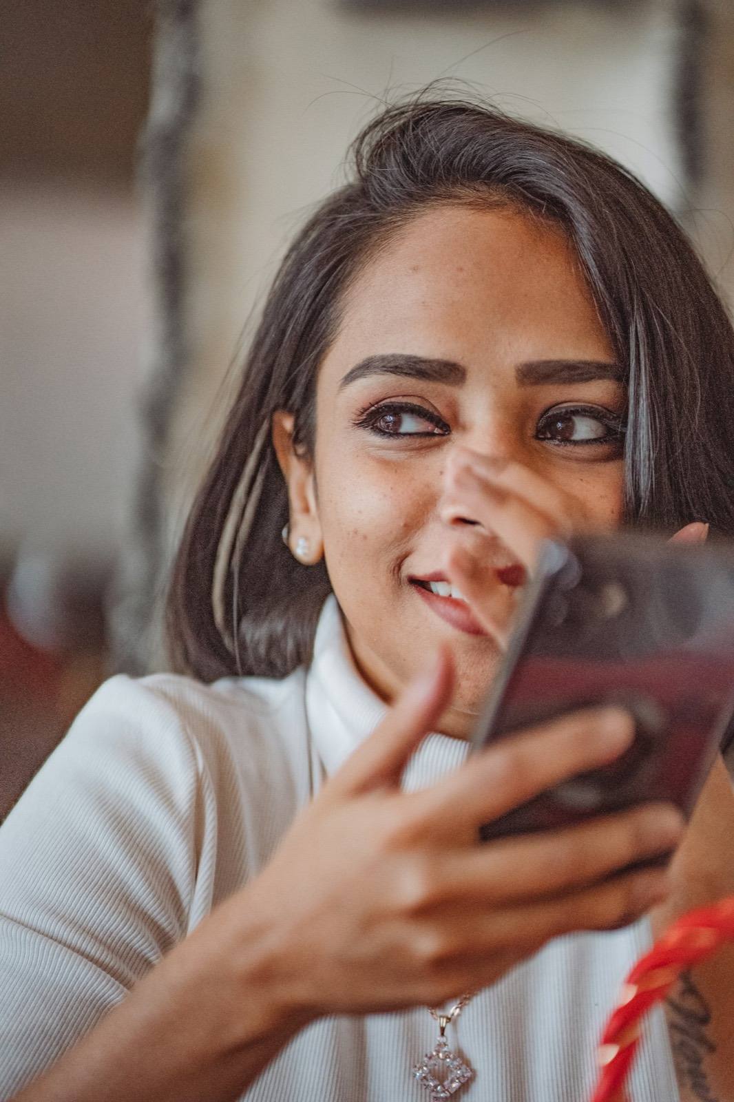 Creator reading comments on phone