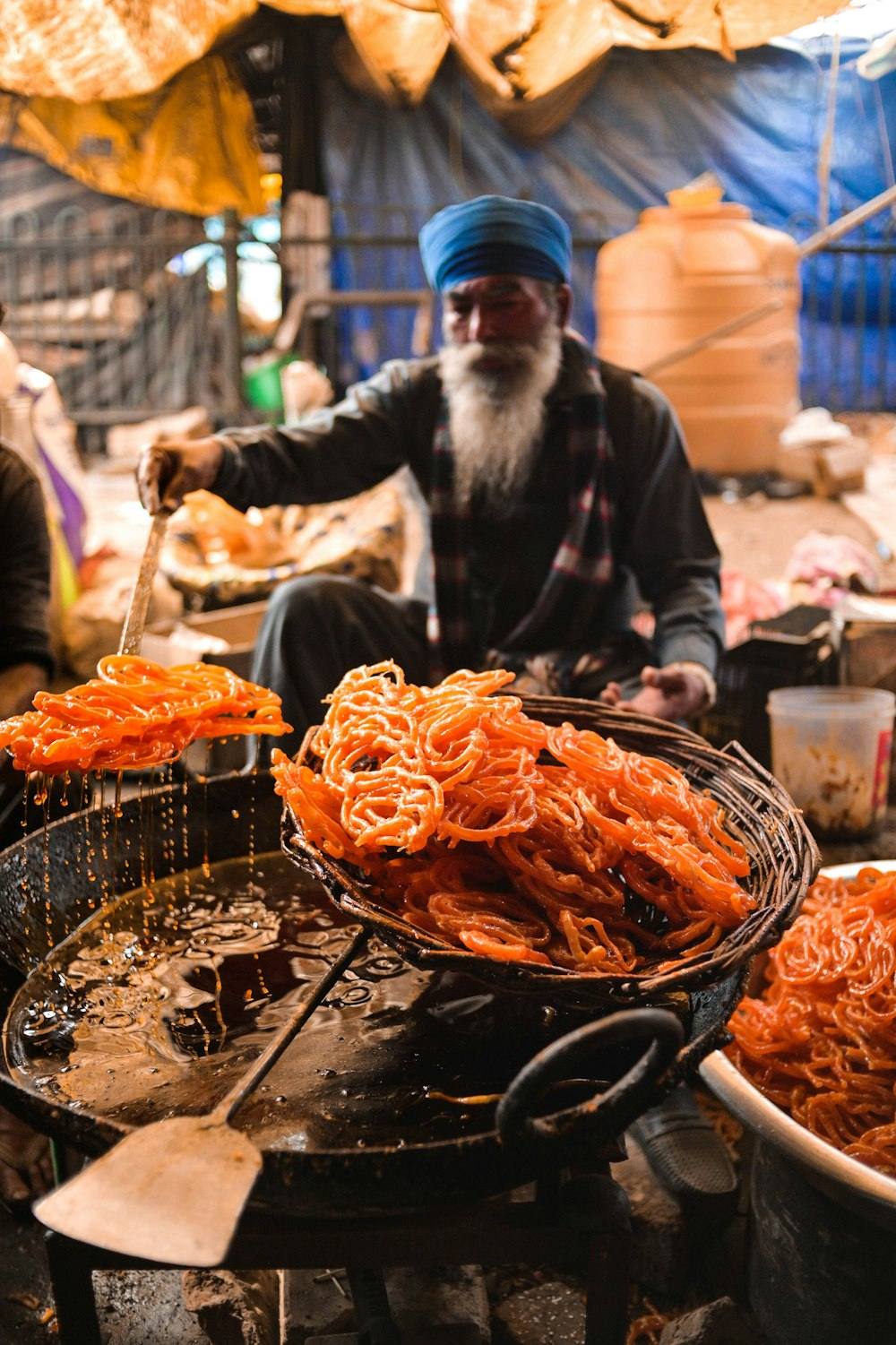 Street food vendor frying jalebis